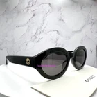 Gucci Sunglasses Black Oval GG1579S 001 New Gray Lens 53MM Women's Authentic. Price: $259.98.