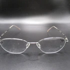 Charmant Titanium Semi-rimless Eyeglass Frames Silver Oval Women's Rx 52-18-135 Pre-owned. Price: $39.43.