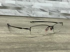 Oakley Transistor 22-216 Brushed Chrome Half Rim Eyeglass Frames Only 54-18-135 Pre-owned. Price: $26.67.