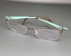 Ovvo Optics 3739 Chocolate/ Seafoam Titanium Eyeglass Frame 56/16/140 *scratched New. Price: $99.95.