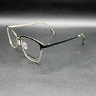 Reflections R799 Eyeglasses Frame Emerald/gold Flex 55-17-140 New Display. Price: $46.00.