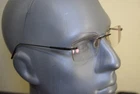 Flexon E1090 001 Free Form Gunmetal Gray Rimless Eyeglasses 54 19 140 Pre-owned. Price: $85.73.