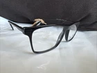 Prada Glasses VPR01W (56-18-145) New. Price: $118.92.