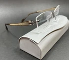 Charmant Line Art XL2152 Brown Rimless Eyeglasses 51-17-135 Case & Cloth Inc New. Price: $249.99.