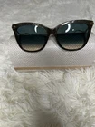 New Without Tags Authentic Jimmy Choo Black Glitter Cat Eye Sunglasses W/ Case. Price: $60.00.