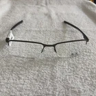 New Oakley Eyeglasses Socket 5.5 OX3218-0654( 56-18 140) Semi-rimless. Price: $85.00.