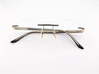 Starck Eyeglasses, Frames Only, SH2021 0001 Matte Black/gold, 48-20-145, Italy Pre-owned. Price: $159.99.