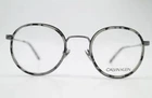 Calvin Klein CK18107 Silver Black Gray Oval Glasses Frame New. Price: $168.00.