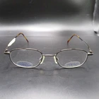 Titmus TR301S Brown Stainless Steel Eyeglass Frames Oval Demo Lens 145MM Temple New. Price: $26.99.
