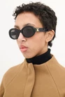 Celine Triomphe CL40194U 01A Black Oval Sunglasses Gold Logo New. Price: $245.00.