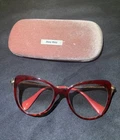 Miu Feminine Woman Glasses With The Case Red Frame And Gold Arm D'occasion. Price: $72.00.