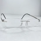 Silhouette Eyeglasses Frames 5369 6063 Silver Rimless 19 150 Austria Pre-owned. Price: $44.49.