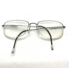 Silhouette 7584 6055 Silver Eyeglasses Frames 54 19 145 Titan L20 Pre-owned. Price: $37.99.