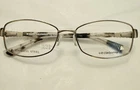 Liz Claiborne L610 0CT7 135 Metal Silver Eyeglass Frames Demo New. Price: $15.00.