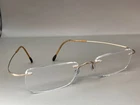Silhouette Eyeglasses Frame 7335 /20 6051 Rimless Silver Titanium 19 140MM Pre-owned. Price: $62.87.