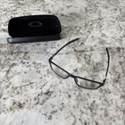 Oakley Eyeglasses Frames Only, Metalink OX8153-0555, 55-17-136, Satin Grey Smoke Pre-owned. Price: $50.00.