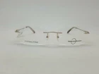 Unit New Naturally Rimless Gold Eyeglass Frame 52-18-135 #395. Price: $102.00.