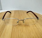 Cartier Platinum Men's Eyeglasses 54-19-140 Half Rim Wooden Temples Frames Only Pre-owned. Price: $1095.00.