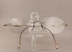 Silhouette 7534 20 6076 Rimless Eyeglasses Frame Titanium Gold Austria 140 Pre-owned. Price: $58.00.