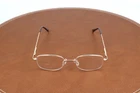 Modern Optical Gold Oval Eyeglasses Frames 50-19-140 New. Price: $29.95.