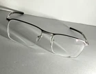 A1 Oakley Conductor 0.5 Eyeglasses Frames OX3187-0353 53-18-137 Polished Chrome Pre-owned. Price: $45.00.