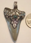 2 Inch Megalodon Fossil Shark Tooth Pendant With Spot Of Turquoise New. Price: $220.00.