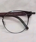 Handmade Ovvo Optics 3707 Raisin Titanium Eyeglass Frames 47/22/140 New. Price: $199.95.