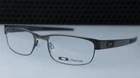 Oakley Metal Plate Pewter 53-18-140 Eyeglasses Titanium Frame New. Price: $240.00.