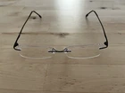 Nikon Rimless Eyeglasses Frames Nc Titanium 50-18-140 0814 Pre-owned. Price: $79.00.