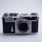 Nikon Sp Silver Titanium Shutter 35MM Rangefinder Film Camera From Japan E0511 Used. Price: $1396.31.