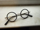 Eyebuydirect Eyeglasses Unisex Black Gold Roaring Round Frame 42-22-145 New. Price: $50.00.