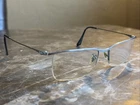 Ray-ban Eyeglass Frames Only 6370 2502 Silver Black Half Rim 55-18-145 (A277) Pre-owned. Price: $27.99.