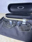 Oakley Tailback 2.0 OX5090 Titanium Eyeglasses Frame With Case 57/16/121 New. Price: $299.99.