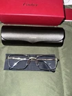 Cartier CT0041O-003 Gold & Black Rectangular Eyeglasses New. Price: $749.00.