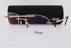 New Silhouette Eyeglass Frames The Dawn 5573/HR 7530 Gold/black 55MM. Price: $299.99.