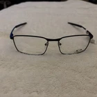 Oakley Fuller 3227-0157 (size 57/17/139) Eyeglasses New. Price: $70.00.