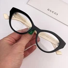 Gucci Women Eyeglasses Black White Temples Cat GG0959O 002 New Authentic. Price: $187.96.