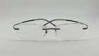 Silhouette 7581 6057 Titan Rimless Eyeglasses Frame Gunmetal 51-17 Pre-owned. Price: $145.00.