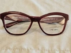 New Prada Vpr 29R 54-17 Eyeglass Frames Opal Bordeaux Red Rectangle Gold Logo. Price: $99.00.