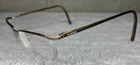 Versace Versus Mod 7041 1045 Gold Metal Half Rim Glasses Brown Temples 51-18-140 Pre-owned. Price: $55.00.