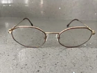 Anne Klein Eyeglasses Italy Frames Only 6008-K1067 Gold Metal 50-19-135 Full Rim Pre-owned. Price: $11.25.