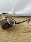 Coach Kian 219 Coffee Eyeglasses Frames Only Women Hearts Half Rim 49-18-135 Pre-owned. Price: $24.97.