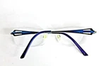 Charmant Eyeglasses CH10952 Blue White Titanium Rimless Frame Size 18 135 Pre-owned. Price: $39.99.