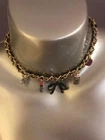 Betsey Johnson Charm Necklace Nwt's Black/gold C-u-t-e ! New. Price: $40.00.