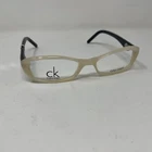 Calvin Klein 5552 105 52-15-135 Cream Black Flex Hinge Eyeglasses D408 New. Price: $72.25.