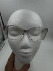 Zenni 2018723 Eyeglass Frames Clear Plastic With Floral Print Eyewear Pre-owned. Price: $9.95.