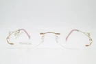 Stepper SI-9749 Titanium Gold Copper Rimless Eyeglass Frame New. Price: $101.86.