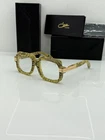 Cazal Legends Yellow Snake Skin Glasses New. Price: $165.00.