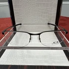 Oakley OX3035-0254 Pewter Metal Eyeglasses 54-18-140 New. Price: $89.49.