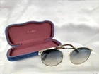 Gucci Sunglasses GG0206SK-005 Pre-owned. Price: $213.41.
